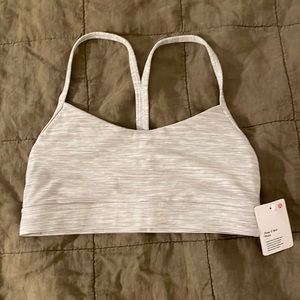 Brand new with tags Lululemon gray Flow Y bra—size 6